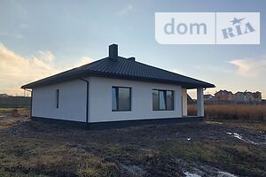 одноэтажный дом с гаражом, 147 кв. м, кирпич. Продажа в Рованцах фото 2