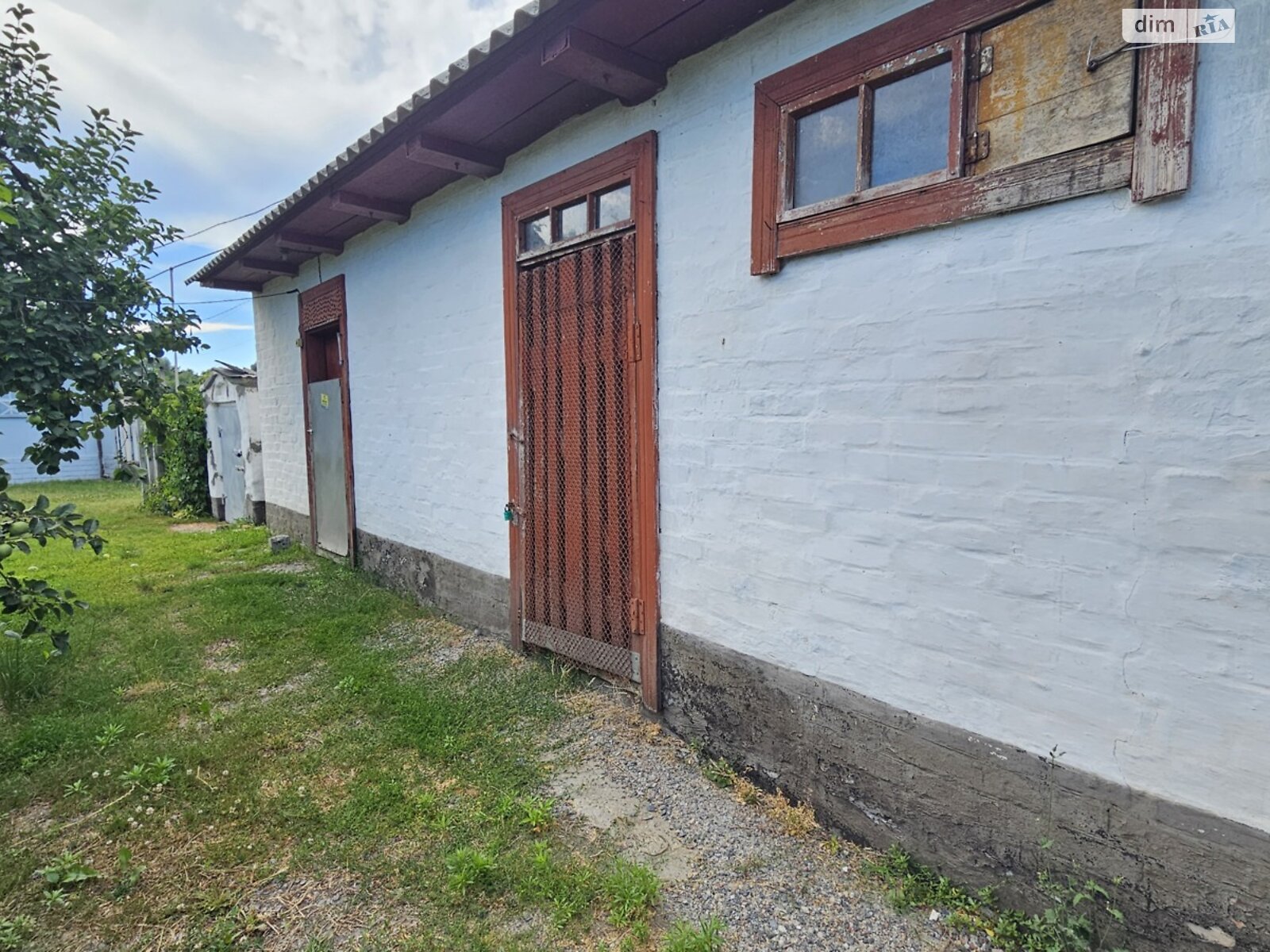 одноповерховий будинок з гаражем, 48.4 кв. м, дерево та цегла. Продаж у Гострій Могилі фото 1