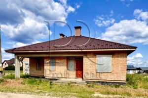 одноэтажный дом с гаражом, 150 кв. м, кирпич. Продажа в Лютиже фото 2