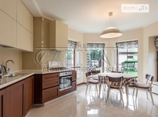 двухэтажный дом с камином, 293 кв. м, кирпич. Продажа в Мотижине (Киевская обл.) фото 1 двухэтажный дом с камином, 293 кв. м, кирпич. Продажа в Мотижине (Киевская обл.) фото 1
