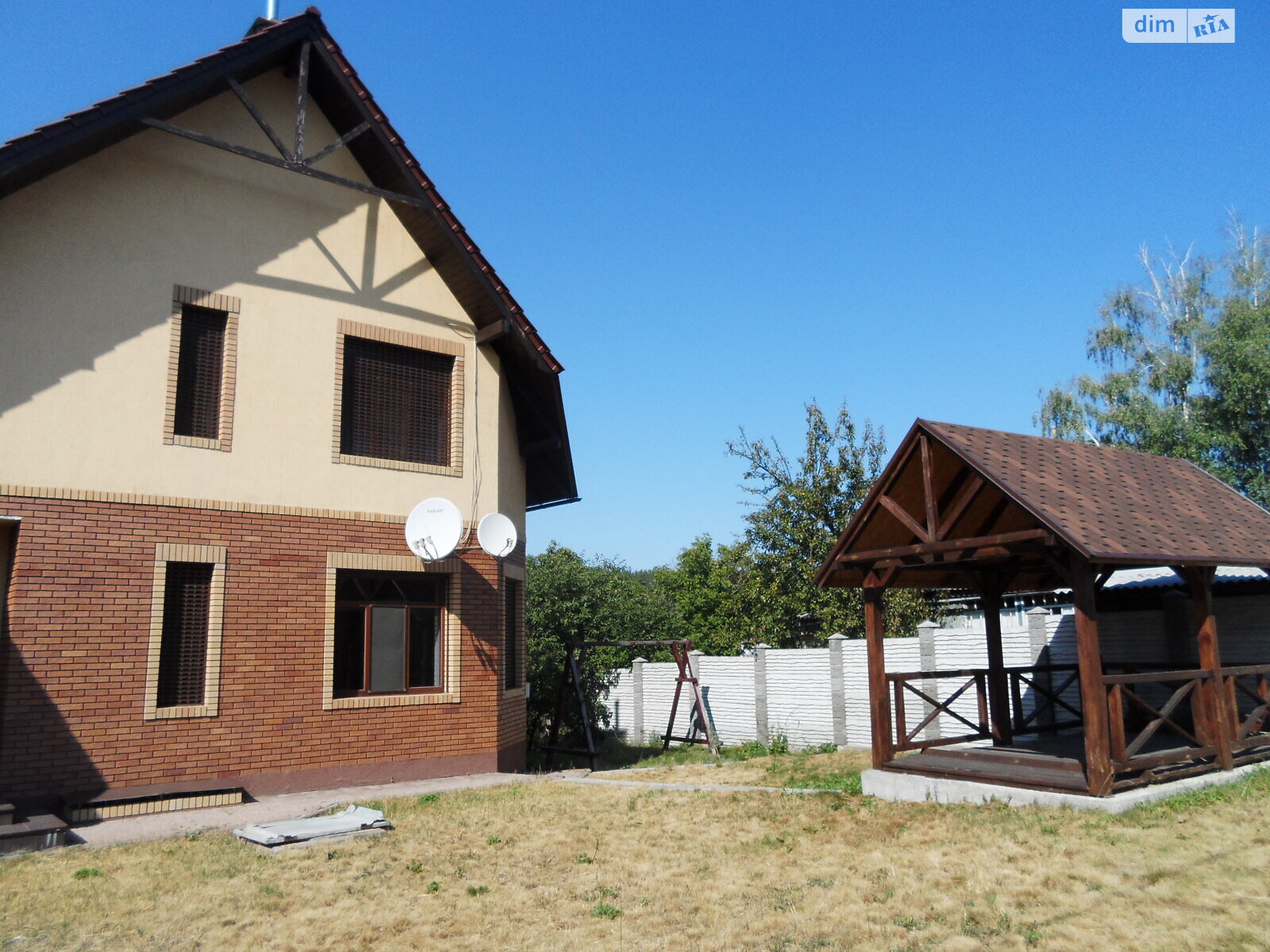 двоповерховий будинок з гаражем, 300 кв. м, кирпич. Продаж у Малютянці фото 1