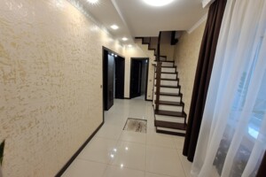 двухэтажный дом с гаражом, 106.6 кв. м, кирпич. Продажа в Молодежном фото 2