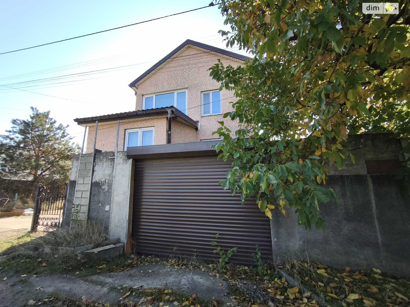 двухэтажный дом с гаражом, 148.1 кв. м, кирпич. Продажа в Молодежном фото 1