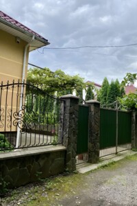 одноповерховий будинок з гаражем, 220 кв. м, цегла. Продаж у Мукачеві фото 2