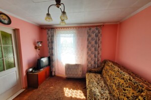 одноэтажный дом с отоплением, 40 кв. м, кирпич. Продажа в Новой Украинке фото 2