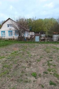 одноэтажный дом с гаражом, 79 кв. м, дерево и кирпич. Продажа в Новгороде-Северском фото 2
