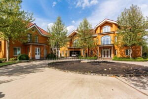 трехэтажный дом с верандой, 1100 кв. м, кирпич. Продажа в Новых Безрадичах фото 2