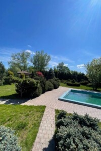 двухэтажный дом с верандой, 670 кв. м, кирпич. Продажа в Подгорцах фото 2