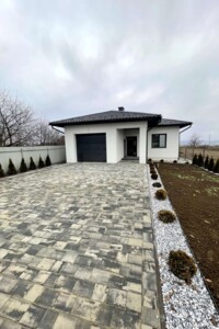 одноэтажный дом с гаражом, 164 кв. м, кирпич. Продажа в Острице фото 2
