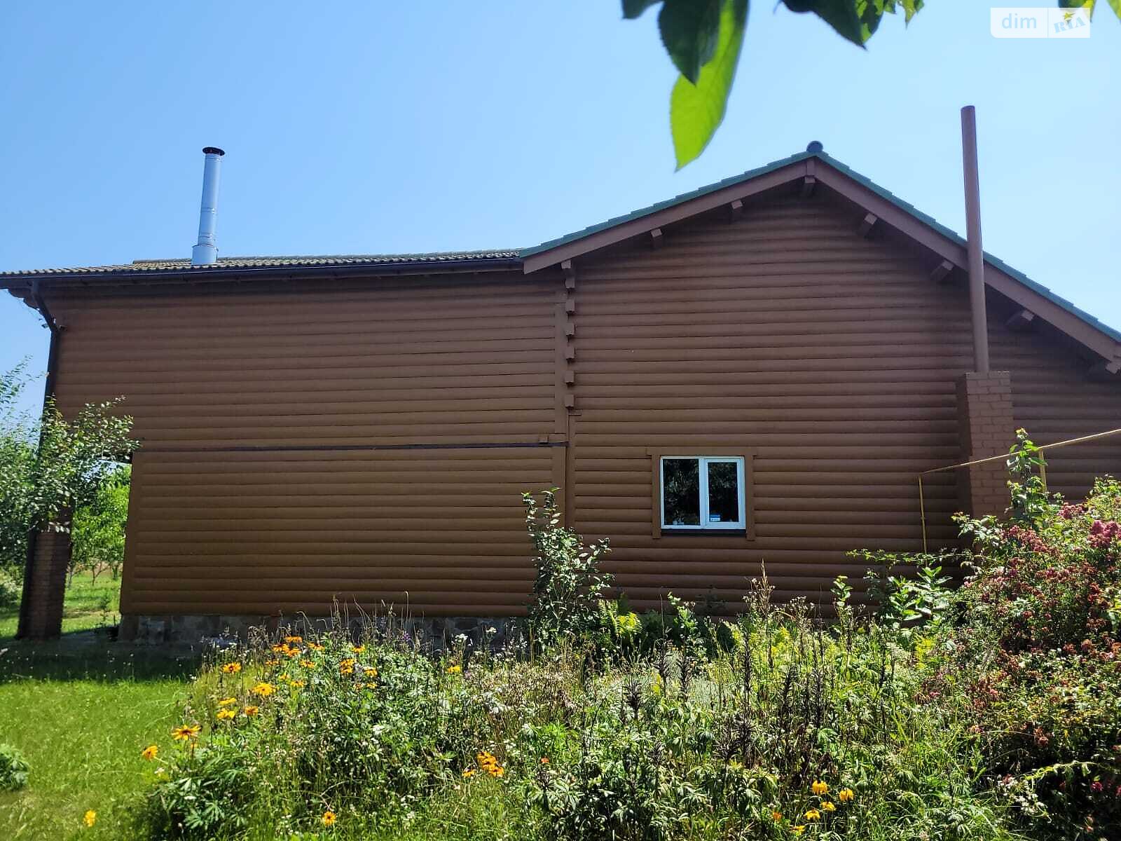 двухэтажный дом с гаражом, 320 кв. м, кирпич. Продажа в Осыковом фото 1