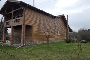 двухэтажный дом с гаражом, 320 кв. м, кирпич. Продажа в Осыковом фото 2