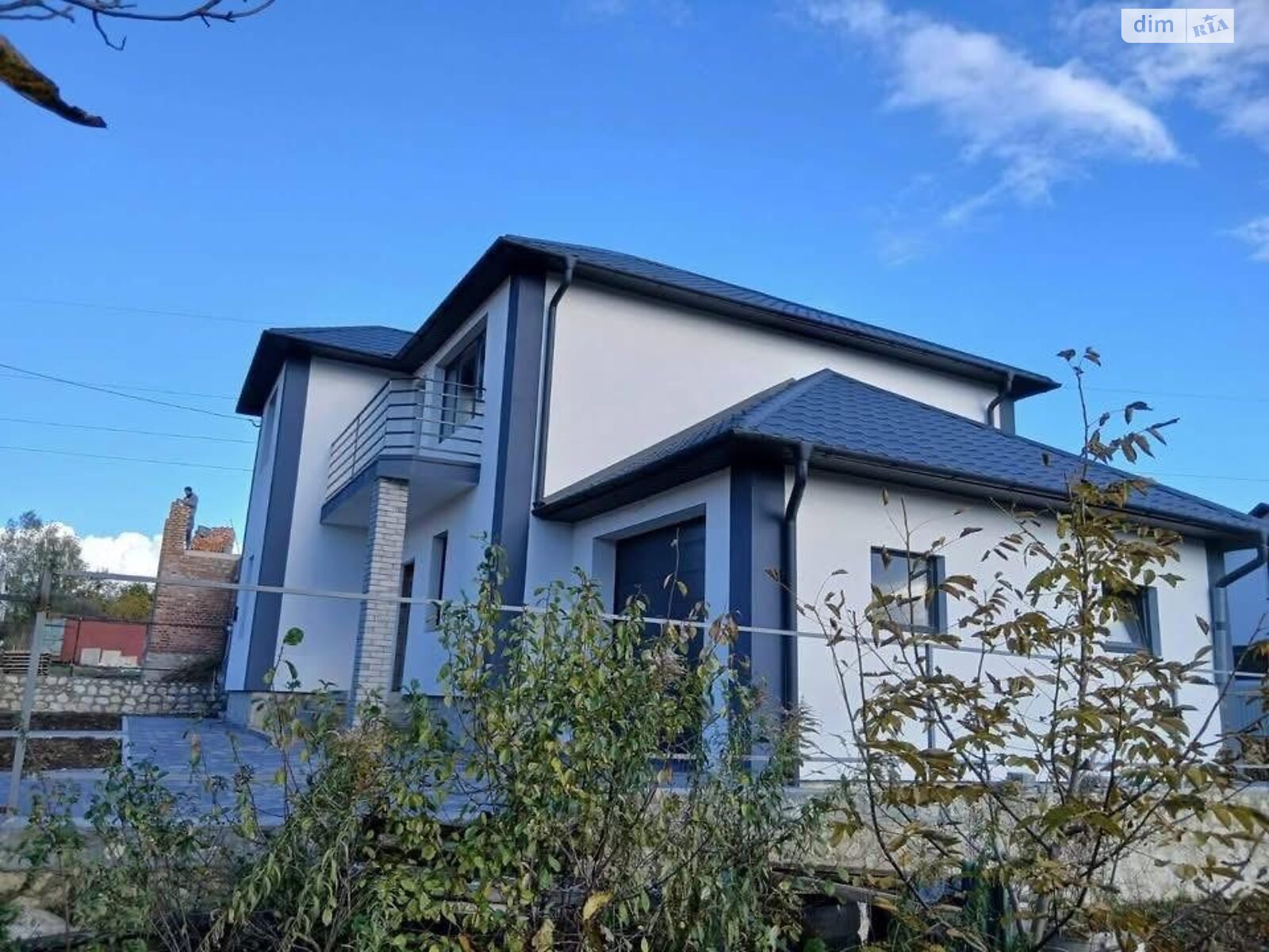 двухэтажный дом с гаражом, 125 кв. м, кирпич. Продажа в Петрикове фото 1