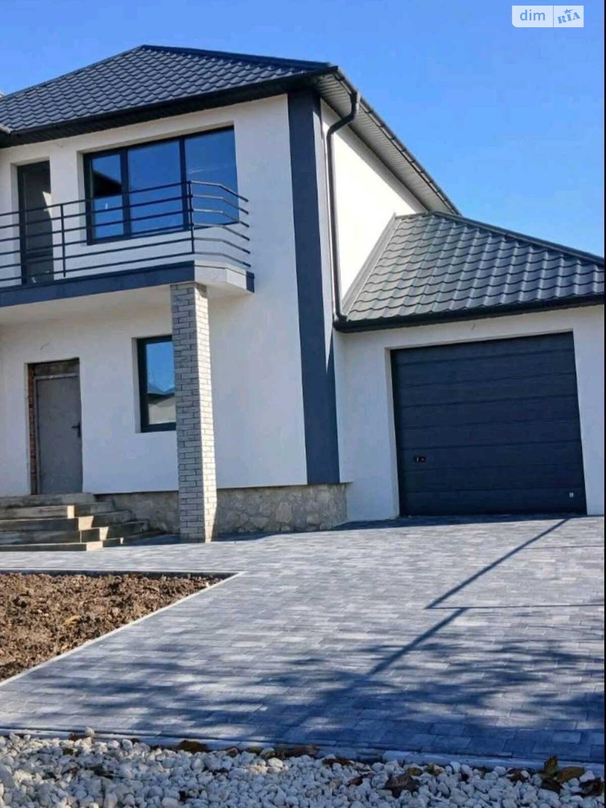 двухэтажный дом с гаражом, 125 кв. м, кирпич. Продажа в Петрикове фото 1