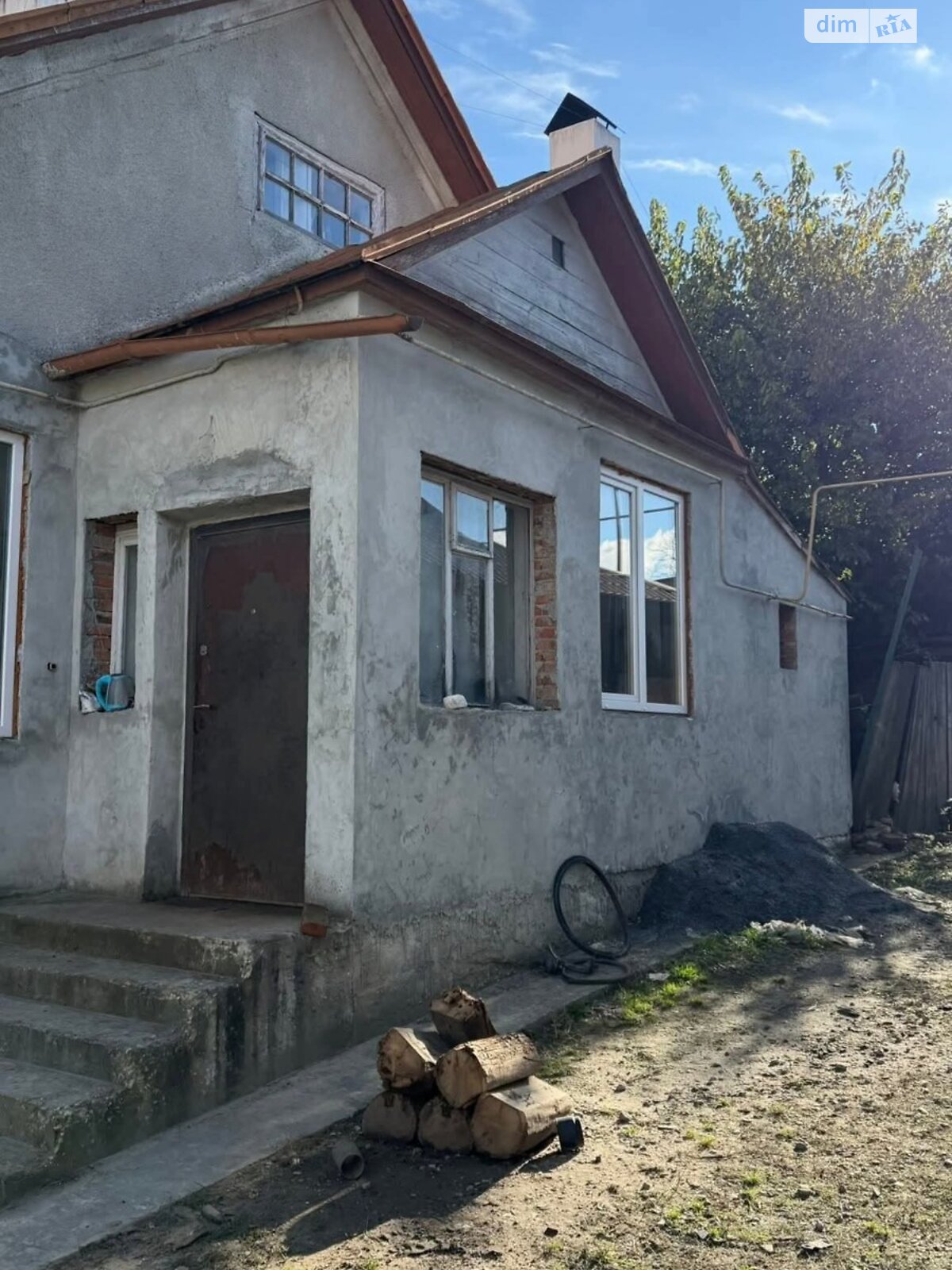 одноэтажный дом с гаражом, 106.5 кв. м, дерево и кирпич. Продажа в Почаеве фото 1