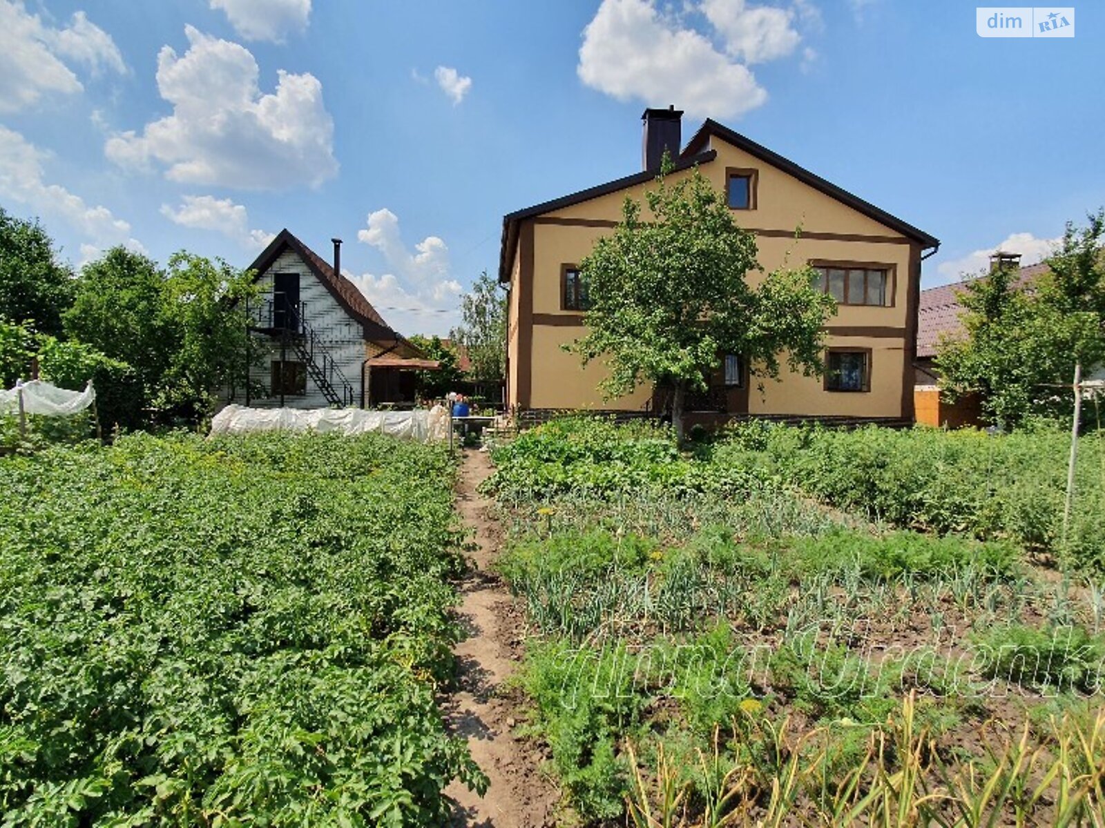 двухэтажный дом с верандой, 231 кв. м, кирпич. Продажа в Подгородном фото 1