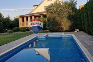 триповерховий будинок з верандою, 234.3 кв. м, дерево та цегла. Продаж у Путрівці фото 2 триповерховий будинок з верандою, 234.3 кв. м, дерево та цегла. Продаж у Путрівці фото 2