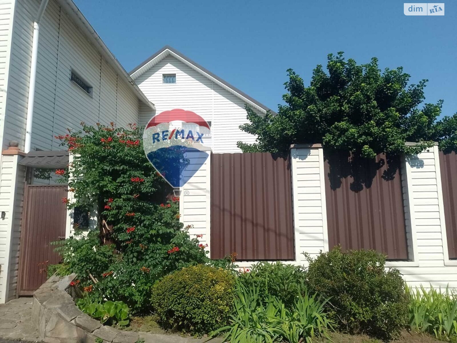 триповерховий будинок з верандою, 234.3 кв. м, дерево та цегла. Продаж у Путрівці фото 1 триповерховий будинок з верандою, 234.3 кв. м, дерево та цегла. Продаж у Путрівці фото 1