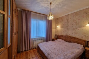 одноэтажный дом с гаражом, 100 кв. м, кирпич. Продажа в Рокитном фото 2