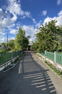 одноэтажный дом с гаражом, 80 кв. м, кирпич. Продажа в Рокитном фото 2