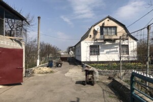 одноповерховий будинок з гаражем, 100 кв. м, цегла. Продаж у Рокитному фото 2