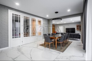 двоповерховий будинок з гаражем, 430 кв. м, кирпич. Продаж у Романкові фото 2