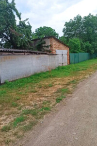 одноэтажный дом с гаражом, 120 кв. м, кирпич. Продажа в Ротмистровке фото 2