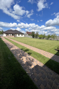 одноэтажный дом с гаражом, 191 кв. м, кирпич. Продажа в Ровно район Золотиев фото 2 одноэтажный дом с гаражом, 191 кв. м, кирпич. Продажа в Ровно район Золотиев фото 2