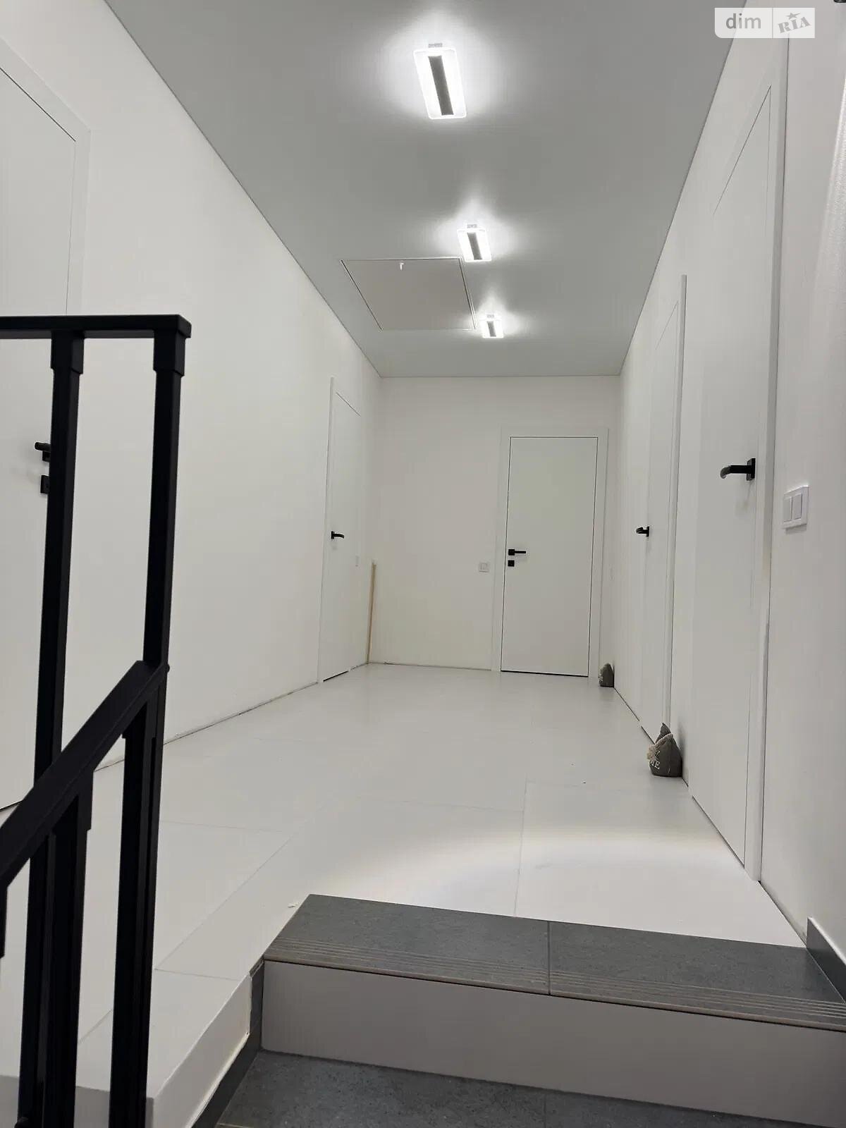 двоповерховий будинок з гаражем, 266.4 кв. м, цегла. Продаж у Рудному фото 1 двоповерховий будинок з гаражем, 266.4 кв. м, цегла. Продаж у Рудному фото 1