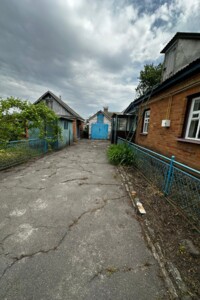 одноэтажный дом с гаражом, 66 кв. м, кирпич саманный. Продажа в Русской Поляне фото 2