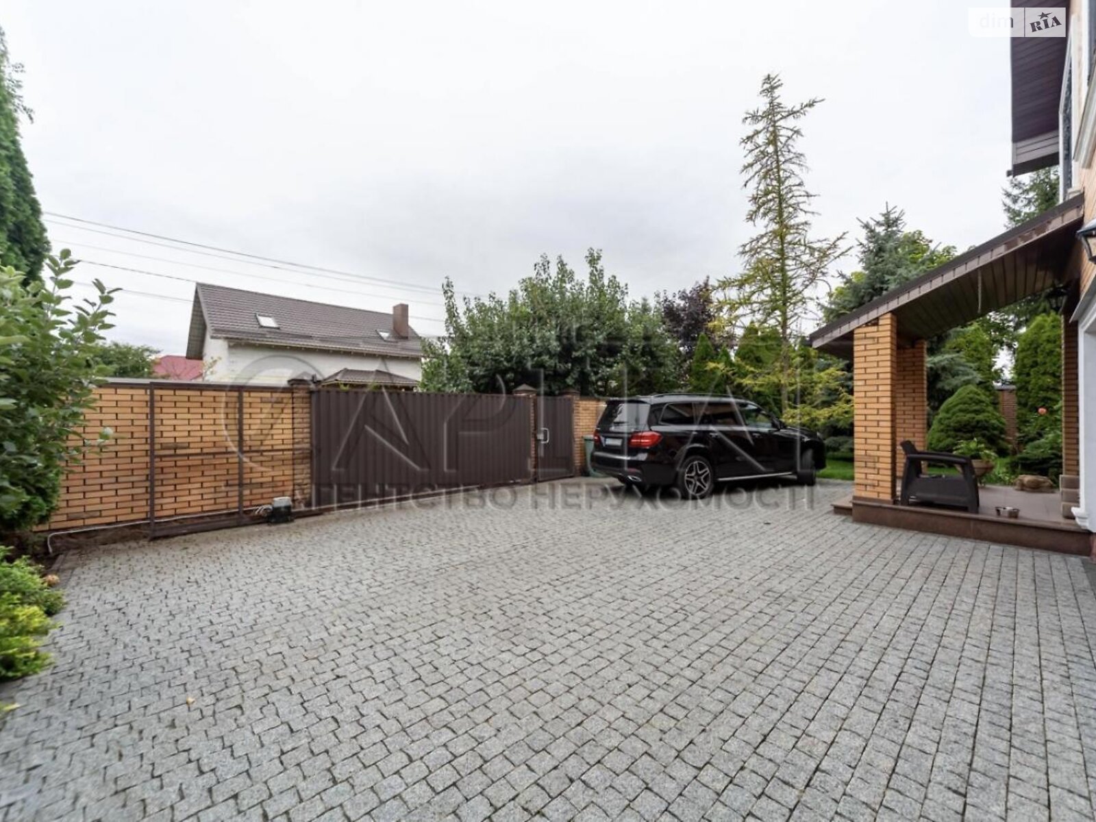 триповерховий будинок з гаражем, 323 кв. м, кирпич. Продаж у Щасливе фото 1