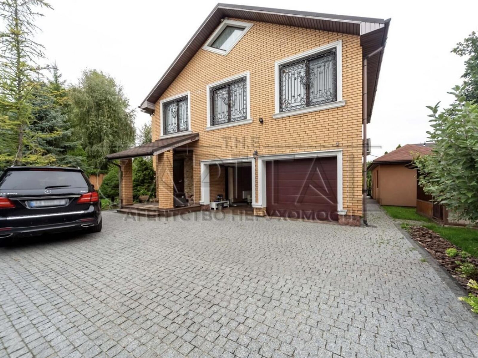 триповерховий будинок з гаражем, 323 кв. м, кирпич. Продаж у Щасливе фото 1