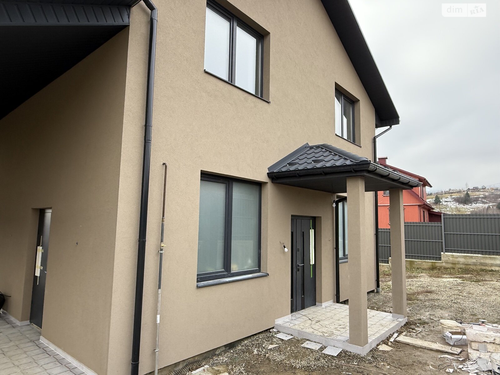 двухэтажный дом с гаражом, 134 кв. м, кирпич. Продажа в Славском фото 1