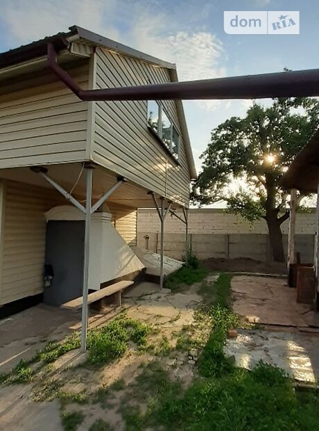 двухэтажный дом с садом, 128 кв. м, дерево и кирпич. Продажа в Смеле район Смела фото 1