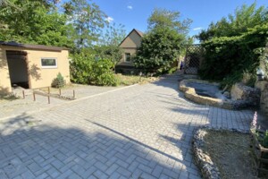 одноэтажный дом с гаражом, 10 кв. м, кирпич. Продажа в Снигиревке фото 2