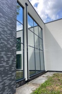 двухэтажный дом с гаражом, 445 кв. м, кирпич. Продажа в Стоянке фото 2