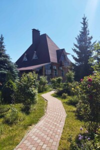 трехэтажный дом с гаражом, 305 кв. м, кирпич. Продажа в Святопетровское фото 2