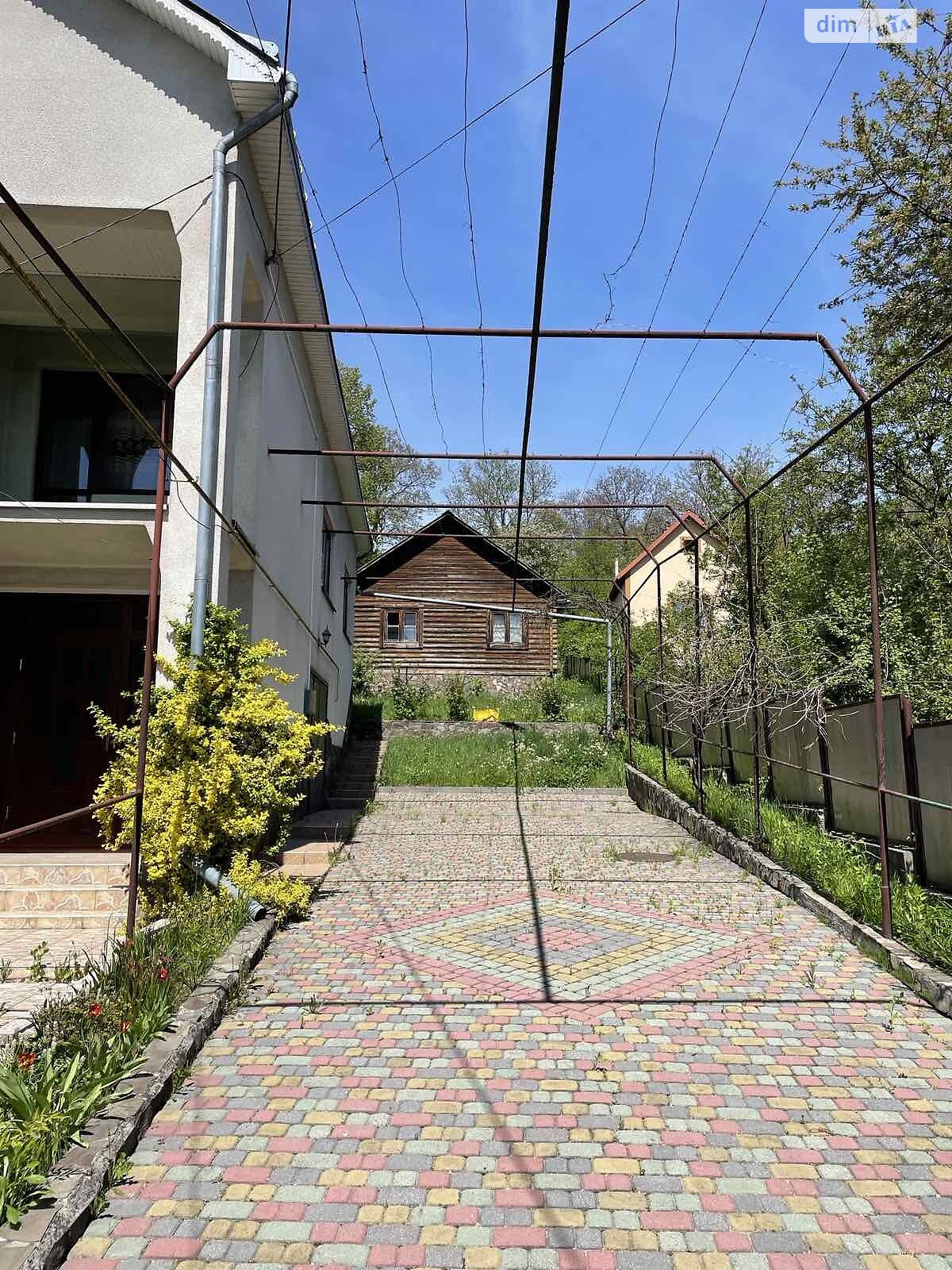 двоповерховий будинок з гаражем, 299.6 кв. м, цегла. Продаж у Тересві фото 1 двоповерховий будинок з гаражем, 299.6 кв. м, цегла. Продаж у Тересві фото 1
