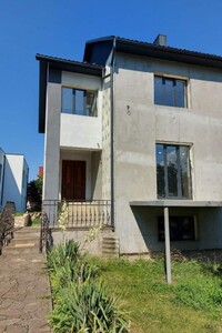 двухэтажный дом с гаражом, 330 кв. м, кирпич. Продажа в Подгородном фото 2