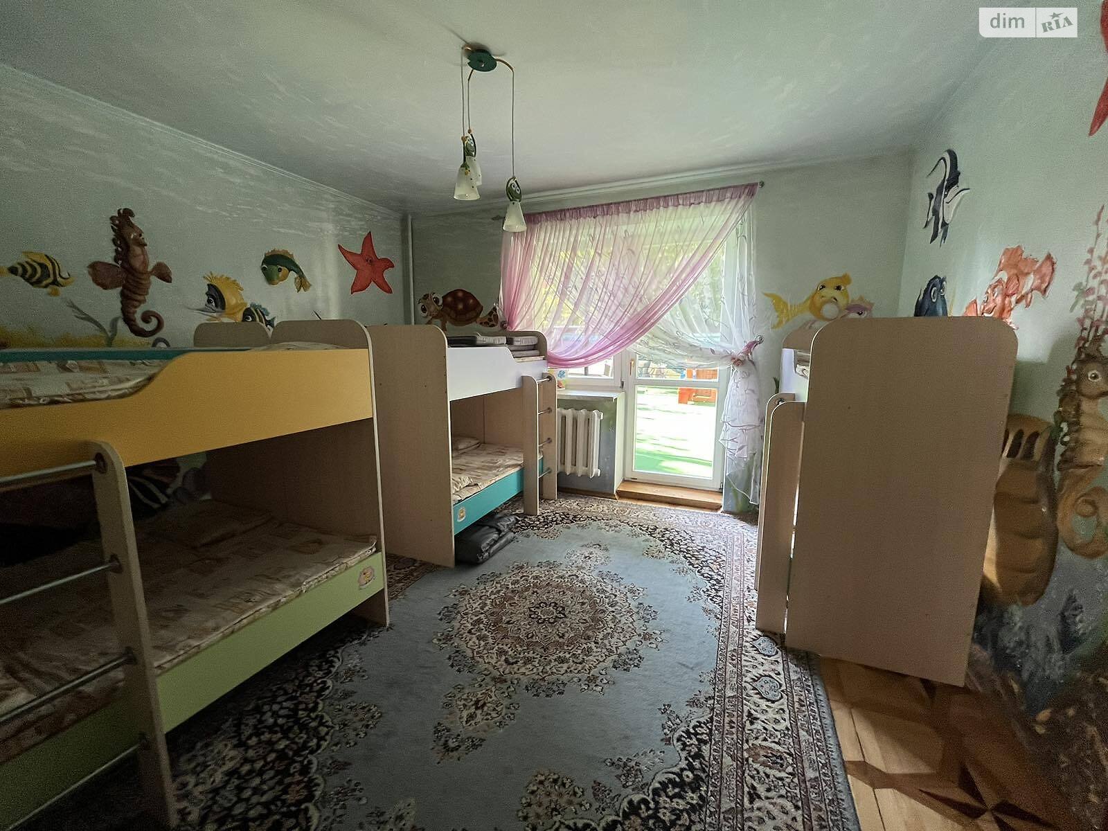 трехэтажный дом, 530 кв. м, кирпич. Продажа в Тернополе район Центр фото 1