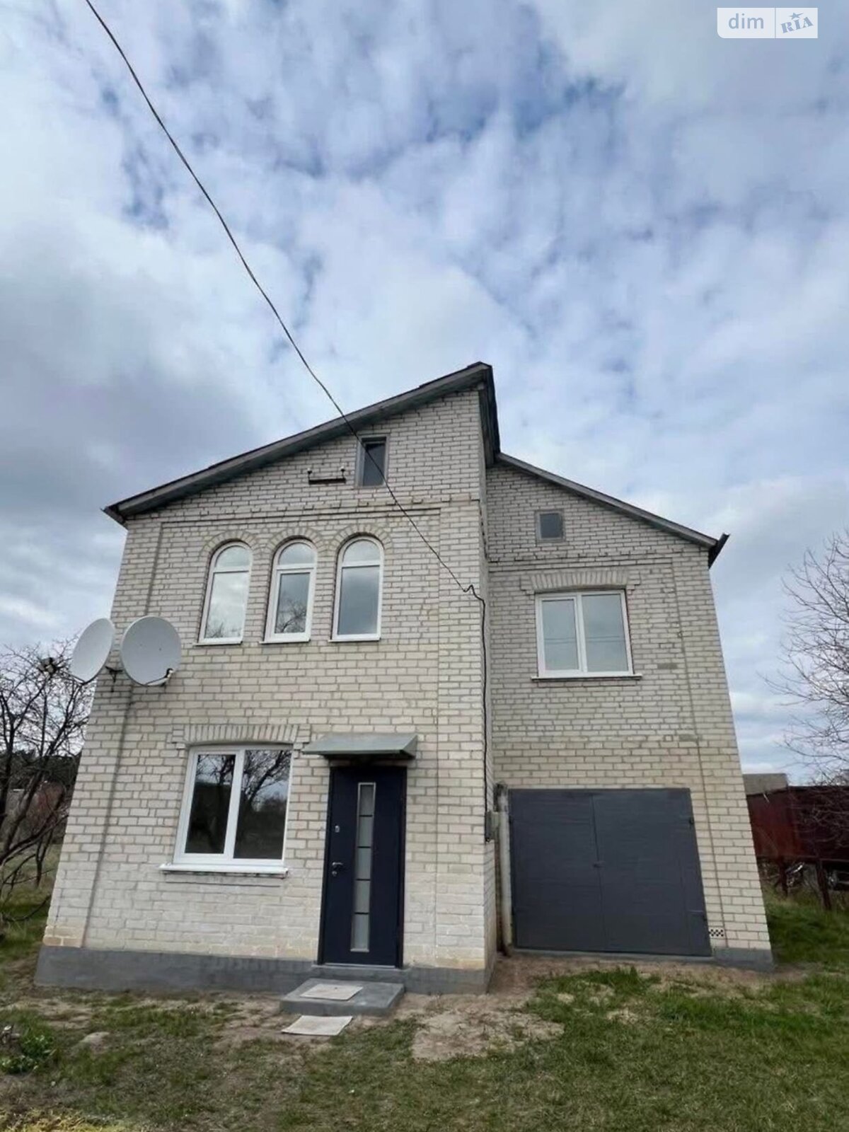 двухэтажный дом с гаражом, 129.7 кв. м, кирпич. Продажа в Томиловке фото 1