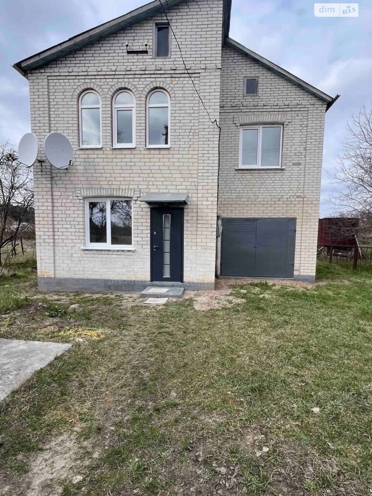 двухэтажный дом с гаражом, 129.7 кв. м, кирпич. Продажа в Томиловке фото 1