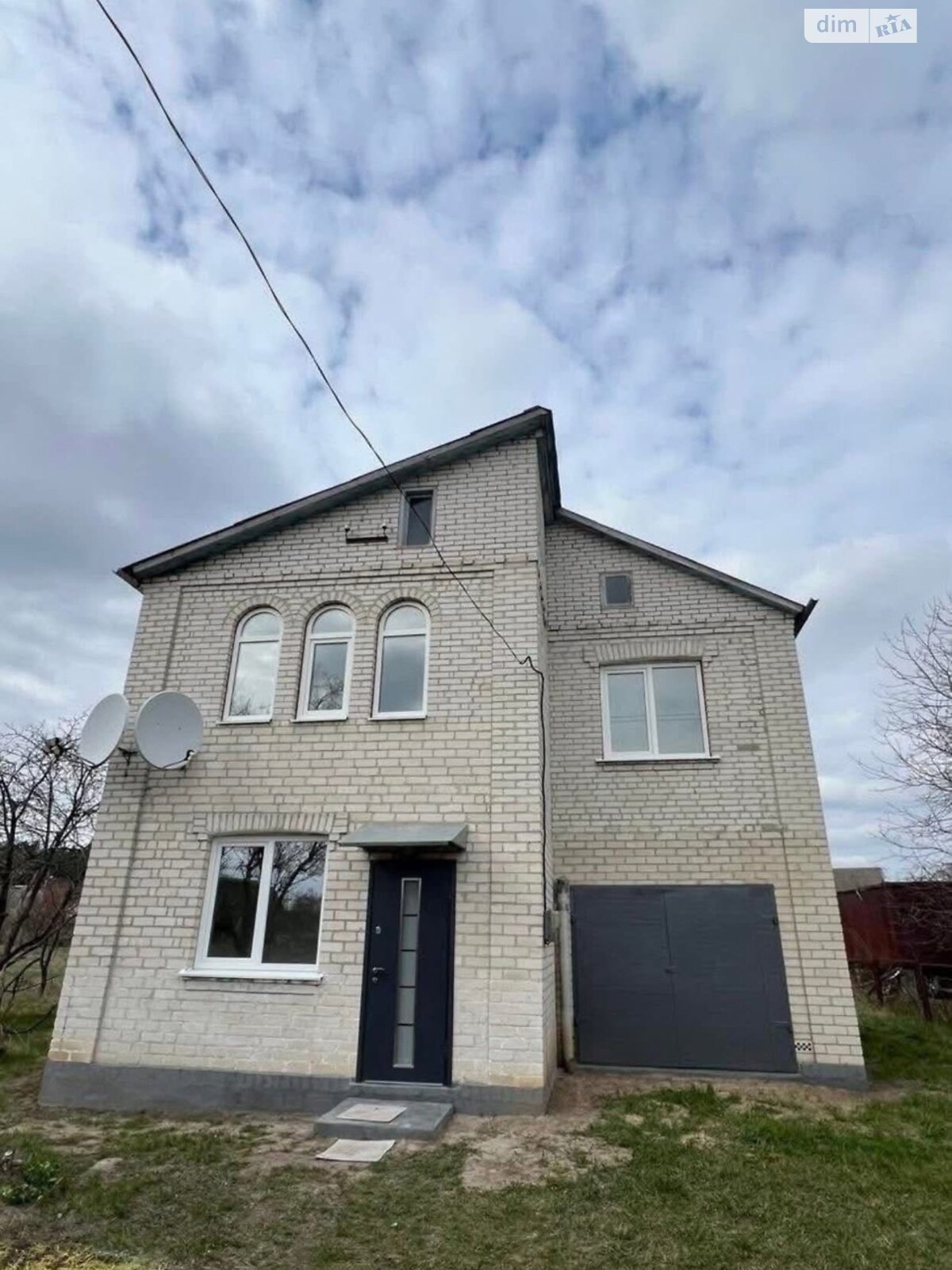 двухэтажный дом с гаражом, 129.7 кв. м, кирпич. Продажа в Томиловке фото 1