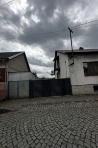 двоповерховий будинок з гаражем, 142 кв. м, цегла. Продаж у Тячеві фото 2