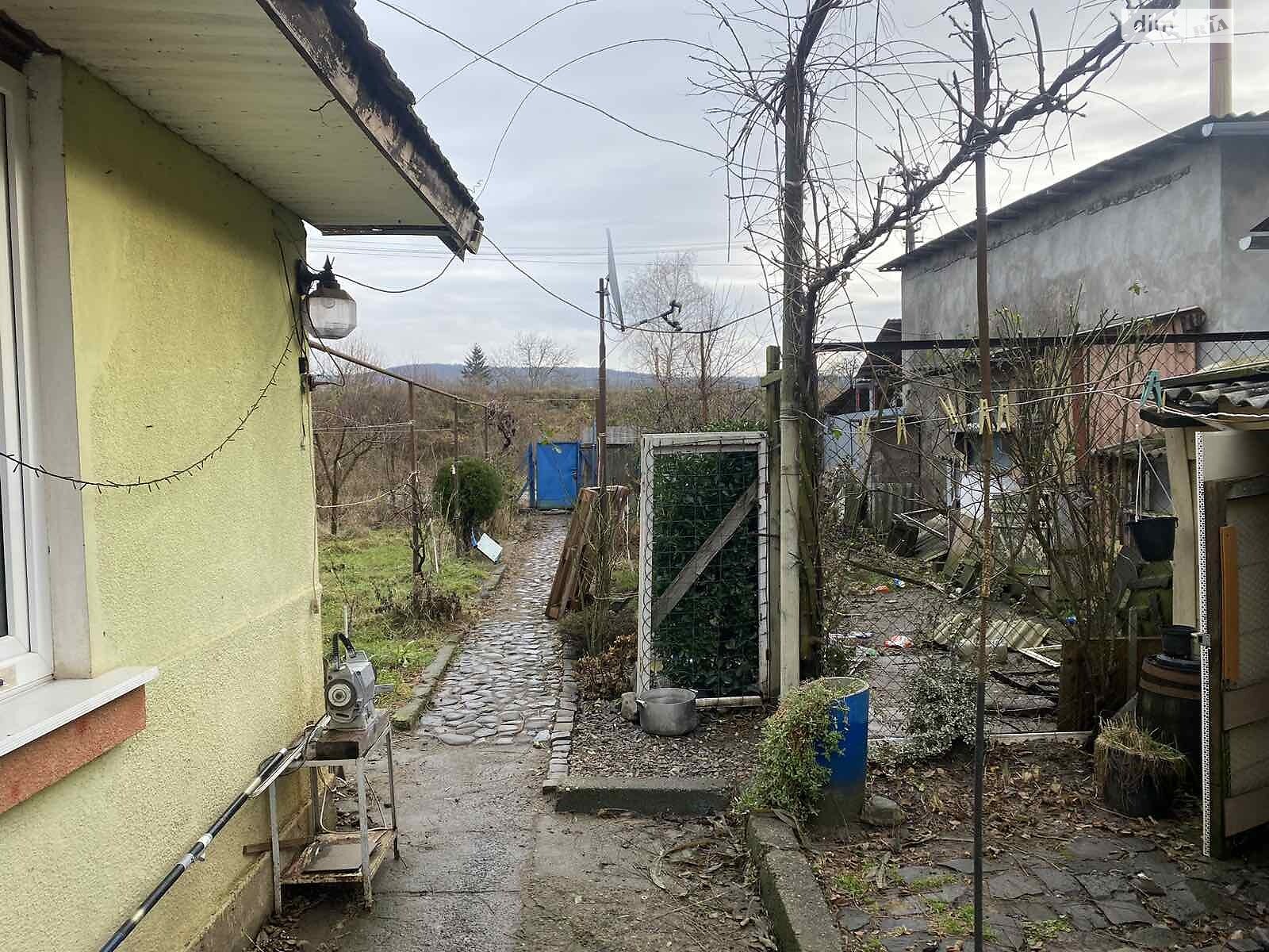 одноэтажный дом с верандой, 80.5 кв. м, кирпич саманный. Продажа в Ужгороде район Центр фото 1