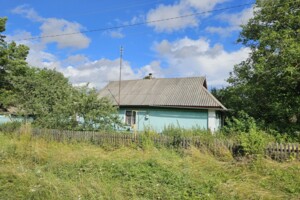 одноэтажный дом с гаражом, 57.6 кв. м, глинобитный. Продажа в Ульяновке район Центр фото 2