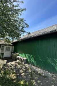 одноэтажный дом с гаражом, 52.9 кв. м, дерево и кирпич. Продажа в Вашковцах фото 2