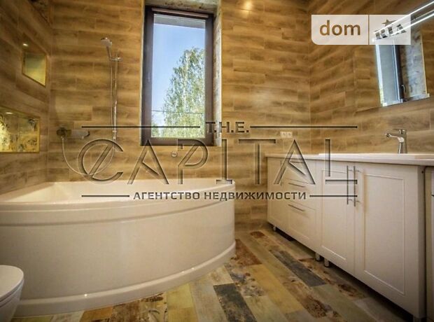 двоповерховий будинок з садом, 220 кв. м, блочно-цегляний. Продаж в Іванковичах (Київська обл.) фото 1 двоповерховий будинок з садом, 220 кв. м, блочно-цегляний. Продаж в Іванковичах (Київська обл.) фото 1