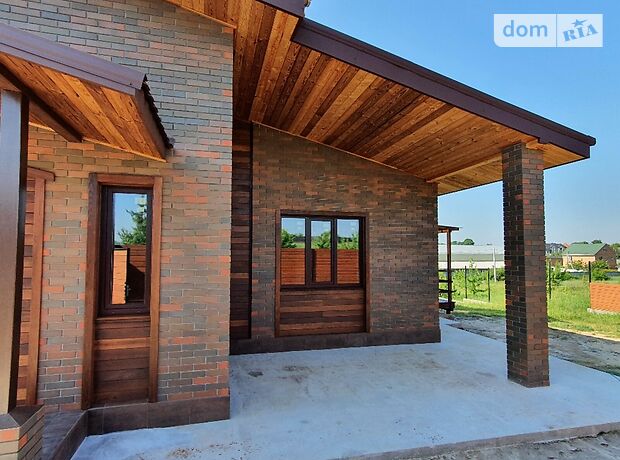 одноповерховий будинок з каміном, 177 кв. м, дерево та цегла. Продаж в Іванковичах (Київська обл.) фото 1 одноповерховий будинок з каміном, 177 кв. м, дерево та цегла. Продаж в Іванковичах (Київська обл.) фото 1