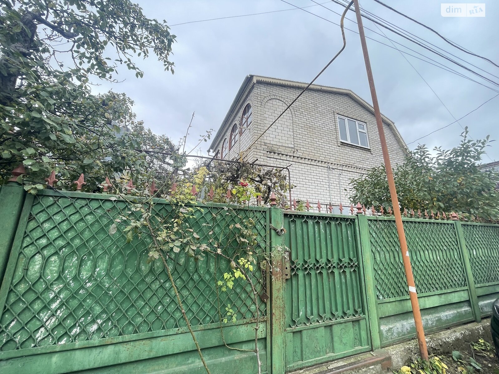 двухэтажный дом с гаражом, 105 кв. м, кирпич. Продажа в Великодолинском фото 1