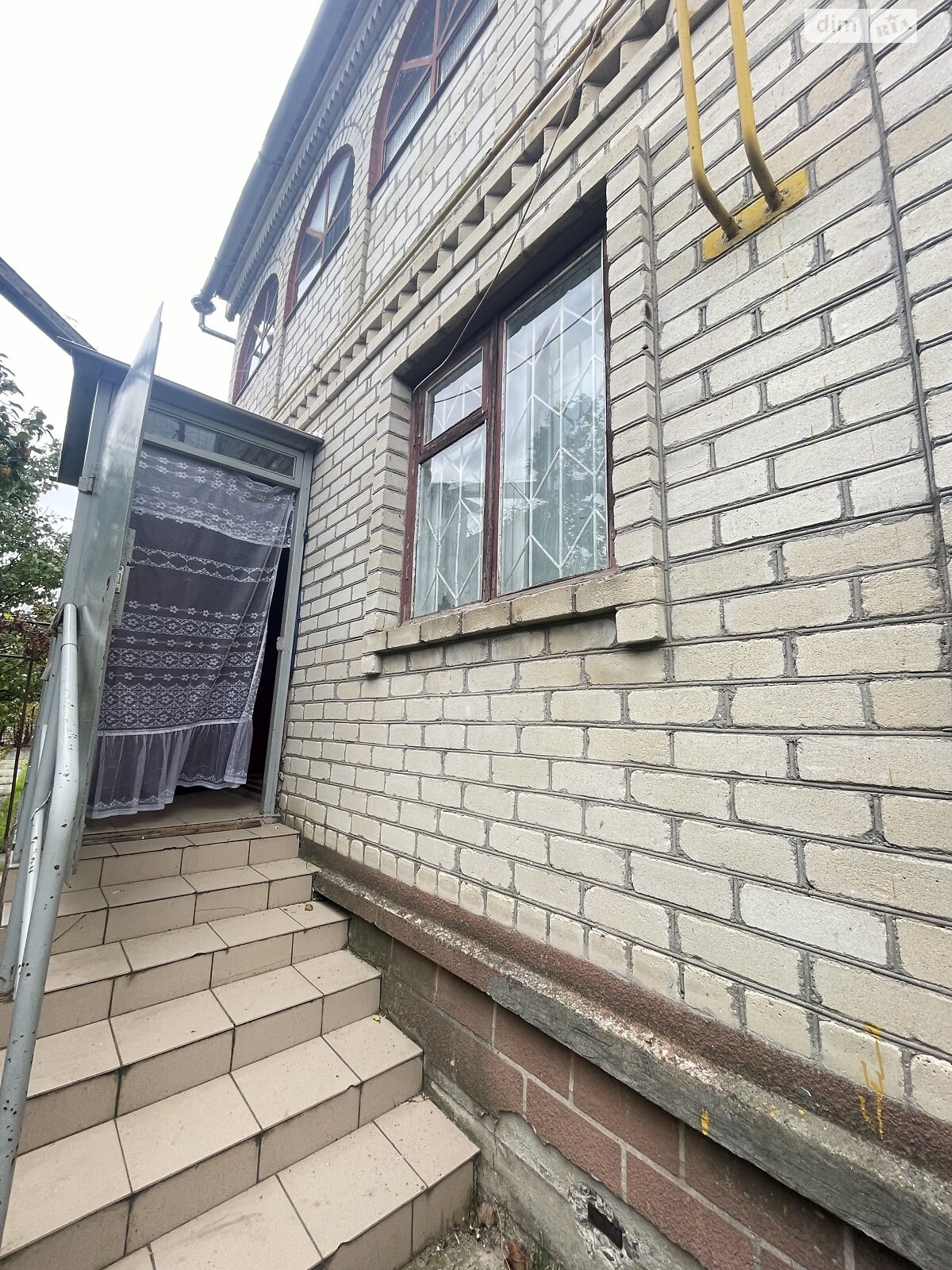 двухэтажный дом с гаражом, 105 кв. м, кирпич. Продажа в Великодолинском фото 1